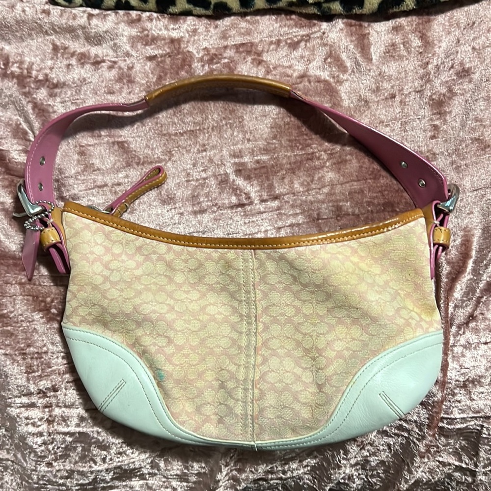 Used original coach purse I don’t have the papers for it but it’s original